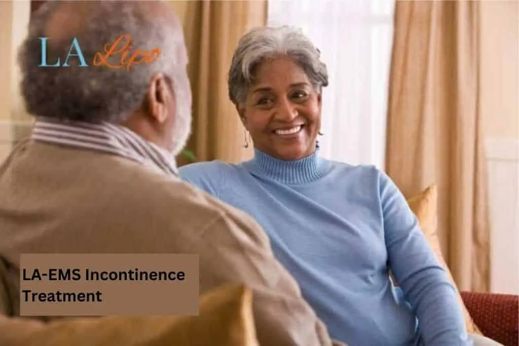 Couple sat smiling at each other - LA-EMS treatment Dagenham
