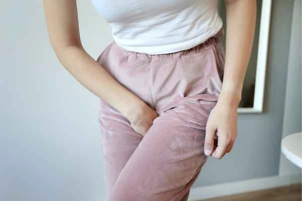woman running for the toilet because of urinary incontinence Dagenham
